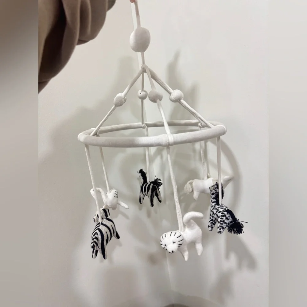 Crate & Barrel Baby Nursery safari animals mobile crib decor newborn neutral